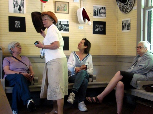2011-05-07 President Norma discussing one of her son’s hats on display as Judy from Kalamazoo, MI, Irene and Leslie, both of Chester look on. DSC01223.jpg